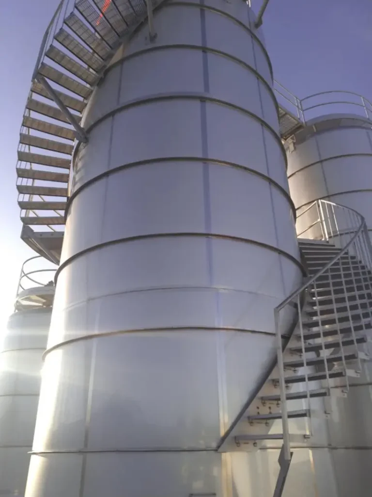 Custom fabricated stainless steel tanks with stairs and access platforms