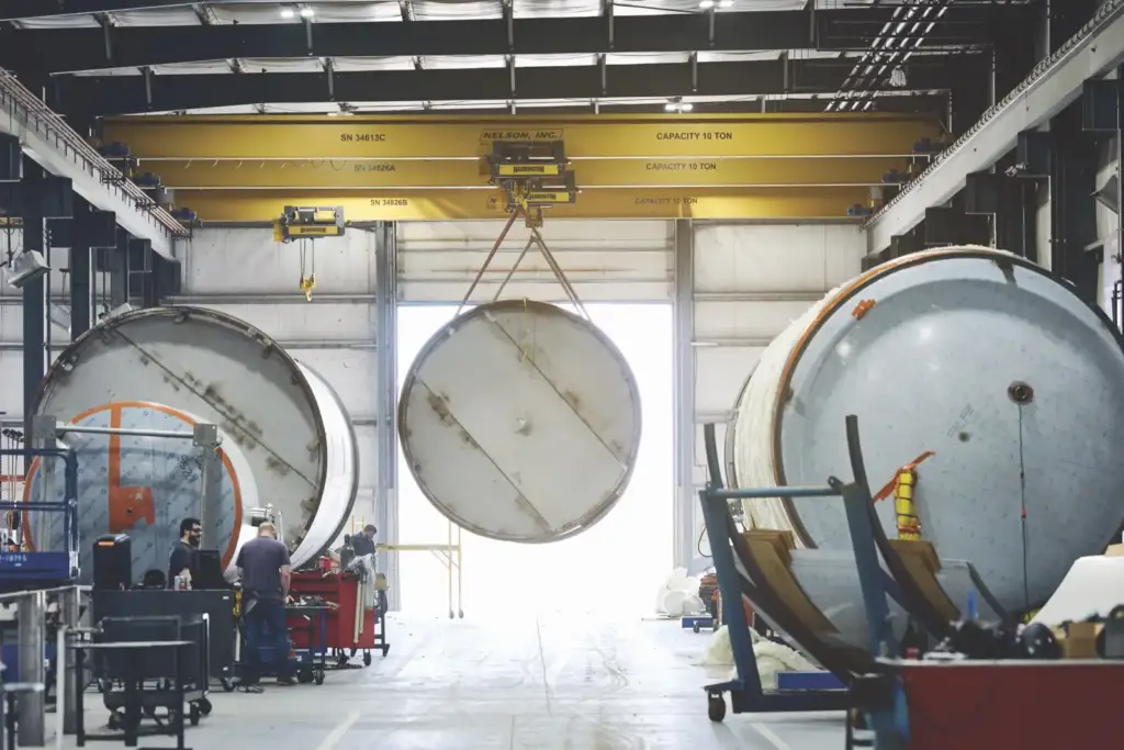 Shop floor, tank heads under the crane