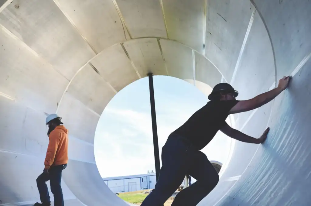 Team inside a tank shell